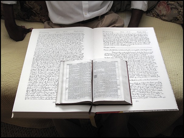 CONTACT INFO: Laura Glazer, (518) 229-9244, helloprettycity@gmail.comCAPTION: Phillip Patterson hand-wrote and hand-bound the five books of Moses into one volume on large sheets of watercolor paper using the 1611 version of the King James bible pictured here on top of his version. When he is finished, the complete handwritten bible will be bound into eight volumes.CREDIT: Laura Glazer